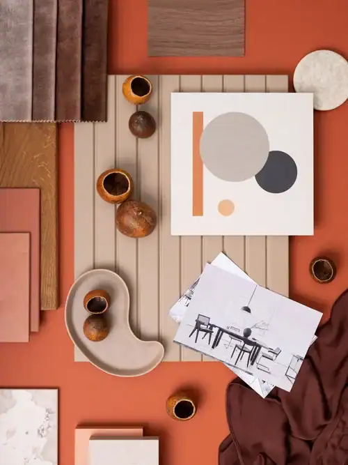 Collage of commercial interior design materials and warm-toned surface samples